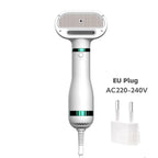 Pet drying brush removing loose undercoat fur from small dog